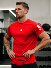 URBAN WOLFS men's red dry-fit t-shirt on muscular model athletic fit moisture wicking gym top